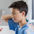 What are at least five symptoms of mild traumatic brain injury?